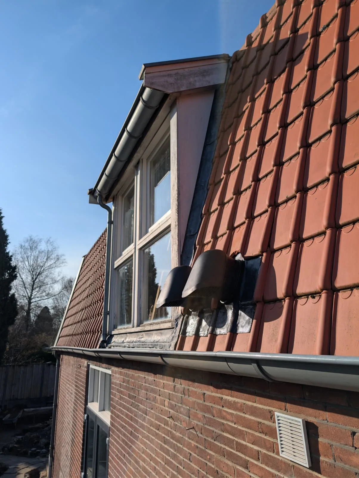 Example of a pitched tiled roof