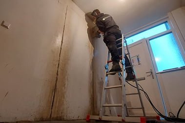Puin afvoeren draagmuur verwijderen